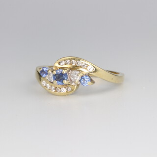 An 18ct yellow gold sapphire and diamond ring size L, 3.5 grams 