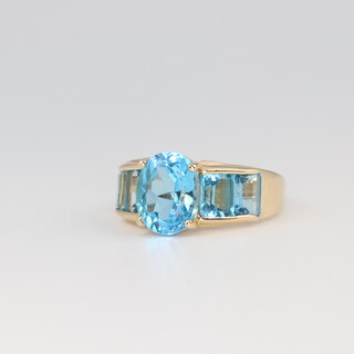 A 10ct yellow gold blue topaz ring size N, 4.1 grams 