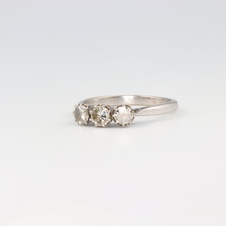 An 18ct white gold 3 stone diamond ring, approx. 0.70ct, 3.1 grams, size L 1/2