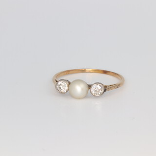 A yellow metal pearl and diamond ring, the cultured pearl 5mm diam. the 2 brilliant cut diamonds each approx. 0.15ct, 1.4 grams, size P 1/2