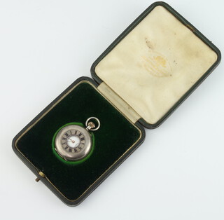 A lady's Edwardian silver cased half hunter pocket watch with mechanical movement, 35mm, in a fitted case 
