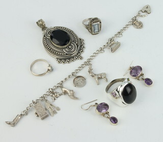 A silver bracelet and minor silver jewellery 100 grams