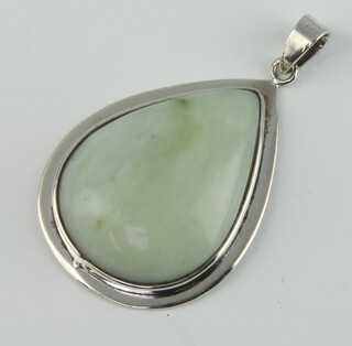 A silver mounted hardstone pendant 