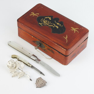 A Victorian novelty fruit knife in the form of a pistol with mother of pearl handle, 1 other, a silver filigree brooch and a heart ditto 