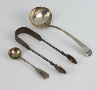 A George III silver ladle, London 1805, a pair of sugar tongs and a mustard spoon 116 grams 