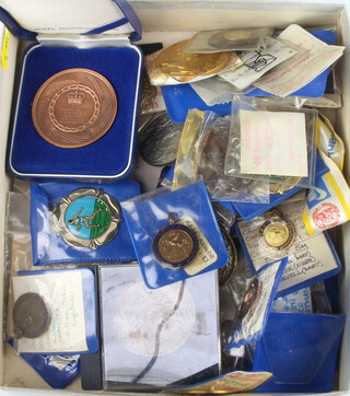 A collection of modern sports medallions