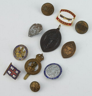 A collection of lapel badges