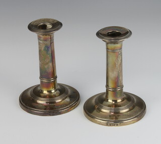 A pair of Edwardian silver candlesticks of plain form Birmingham 1902, 14cm 