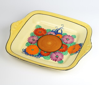 A Clarice Cliff Bizarre Gayday pattern sandwich plate with moulded leaf handles 27cm 