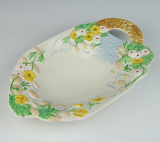 A Clarice Cliff moulded dish decorated with buttercups having a basket weave handle, no.89A 
