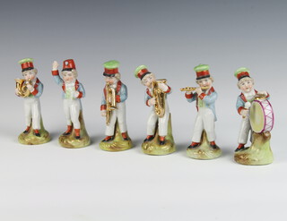 A German porcelain band of 6 child players 12cm 