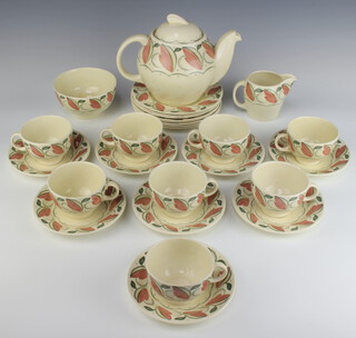 A Susie Cooper Beechwood pattern tea set comprising 8 tea cups, 8 saucers, teapot, sugar bowl, cream jug and 8 small plates 