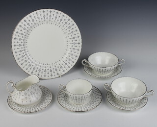 A Paragon part tea and dinner service comprising 5 tea cups, 5 saucers, six 2 handled bowls, 7 saucers, 6 small plates, 6 medium plates, 6 dinner plates, milk jug, sugar bowl 