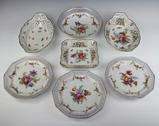 A German pierced porcelain basket with spring flowers 30cm, an ensuite square dish 16cm together with a similar oval dish 30cm, 3 octagonal pierced plates and a ditto bowl 