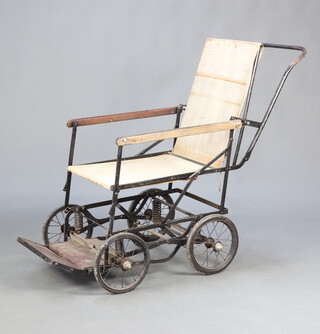 A 1940's tubular metal framed folding, 4 wheeled, wheelchair 100cm h x 101cm w x 50cm (seat 35cm x 44cm)  