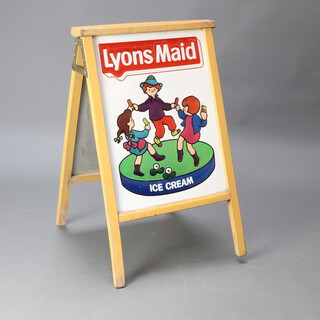 A 1970's pressed metal, enamel and beech framed folding A frame sign for Lyons Maid Ice Cream 84m h x 51cm w x 55cm d 