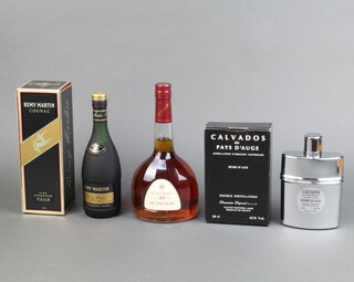 A 35cl bottle of Remy Martin champagne cognac boxed, a 20cl bottle of Calvados Du Pay D'auge brandy boxed and a 70cl bottle of De Valcourt 10 year old brandy 