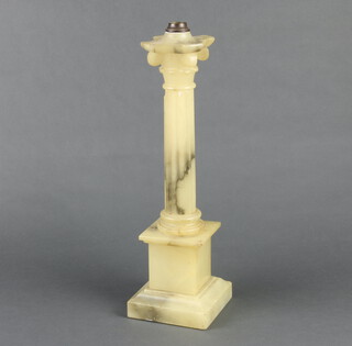 An alabaster table lamp base in the form of a reeded column with Corinthian capital 41cm h x 12cm w x 13cm d 