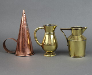 A 19th Century bell brass shaped jug 5cm h, an Art Nouveau brass jug with stylised handle 4cm h and a copper ale warmer 23cm 