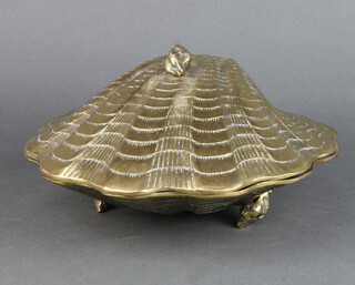A brass trinket box with hinged lid in the form of a clam shell 13cm x 29cm x 27cm 