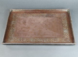 Keswick, an Arts & Crafts rectangular planished and embossed copper tray (ex silver plated) decorated a Tudor rose, thistle, shamrock and acorns, marked SRAI 2cm x 47cm w x 32cm d 