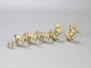 Two polished brass figures of rearing horses 19cm h, together with brass figures of walking horses 16cm h and 1 of a foal 8cm h 