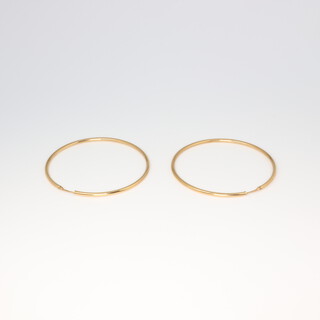 A pair of 18ct yellow gold hoop earrings 3.1 grams