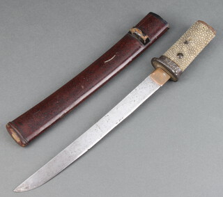 A Japanese Tanto with 26cm unsigned blade with shagreen grip and lacquered case, missing its Kogatana