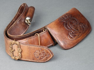 A reproduction Victorian light brown leather cross belt complete with pouch and  associated Metropolitan Police whistle  