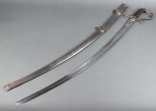 A 19th Century Italian light cavalry sabre with scabbard, the etched blade decorated trophies dated 1836, Sabruna.