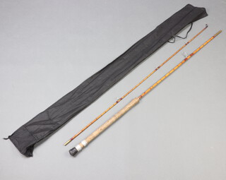 A Lindon of London, Manchester and Bristol 8' split cane combination fishing rod in a black cloth bag 