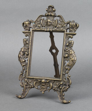 A Victorian cast gilt metal easel photograph frame with basque decoration 28cm h x 17cm w x 15cm d 