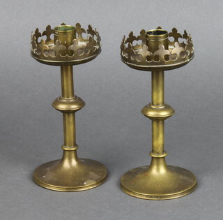 A pair of Benson style gothic brass candlesticks 15cm h x 7cm d 