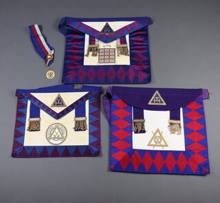 Two Royal Arch Grand Officer's aprons, an Eastern archipelago Royal Arch apron collar and collar jewel  