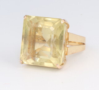 A yellow metal citrine single stone ring 18mm x 16mm, size K 1/2, gross weight 11.6 grams 