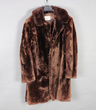 A lady's brown beaver lamb jacket 