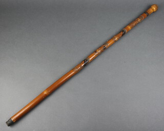 A Chinese carved bamboo walking stick decorated 4 portraits and signed to the base 89cm l 