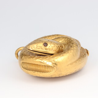 A Victorian novelty gold plated vesta in the form of a entwined snake with ruby eyes