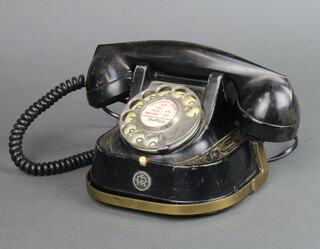 A Bell metal cased dial telephone (some paint loss) 

