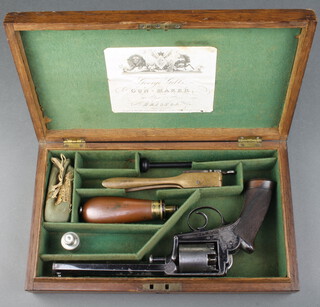 A 54 bore five shot Adams percussion revolver, retailed by George Gibbs of 20 Clare Street Bristol, the chamber with London proof mark and marked Deane Adams and Deane 30 King William Street London Bridge, the cylinder with London proof mark and serial no.11643R, the  butt fitted a cap box, contained in an oak case fitted a bullet mould, cleaning rod, copper and brass powder flask by G & J W Hawksley 