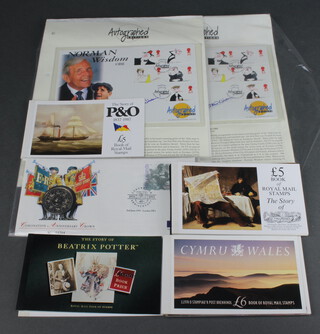 Fourteen various Elizabeth II five pound presentation sets of stamps  together with 2 first day covers
