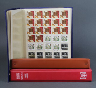 An album of used GB stamps, a Stanley Gibbons Worldex album of used stamps - Switzerland, Italy, East Africa and an alum of stamped envelopes 