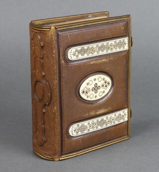 A Victorian leather bound and brass mounted photograph album 4cm x 11cm x 15cm 