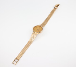 A lady's Garrards 9ct yellow gold quartz wristwatch on a ditto bracelet 20 grams gross including glass