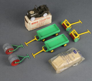 A Minic jeep no.1 boxed, (no key), 2 Dinky Meccano trolleys, 2 garden lawn rollers and 2 Minic lawn mowers 