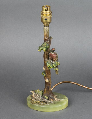 A 1930's Art Deco cold painted bronze table lamp in the form of hen and cock pheasant on a tree, raised on an oval onyx base 27cm h x 13cm w x 9cm d 