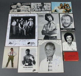 A red autograph album including signatures of Stanley Matthews, Eddie Culvert, David Hughes, Des O'Connor etc together with black and white promotional photographs signed by Leo Sayer, Brian Jacks, Noel Edmonds, Frank Bruno, The Wombles, Kenny Everett etc 