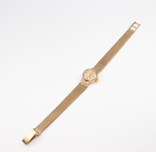 A lady's 9ct yellow gold Omega wristwatch on a ditto bracelet, gross weight 17.7 grams