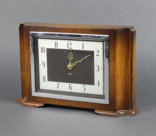 Smiths, an Art Deco timepiece with square silvered dial and Arabic numerals contained in an oak case 20cm x 29cm x 7cm, fitted with a quartz battery operated movement 