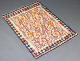 A white, green and orange ground Chobi Kilim rug 143cm x 102cm 
